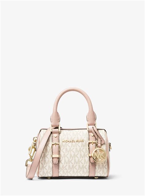 michael kors bedford crossbody pink|Michael Kors pink suitcase.